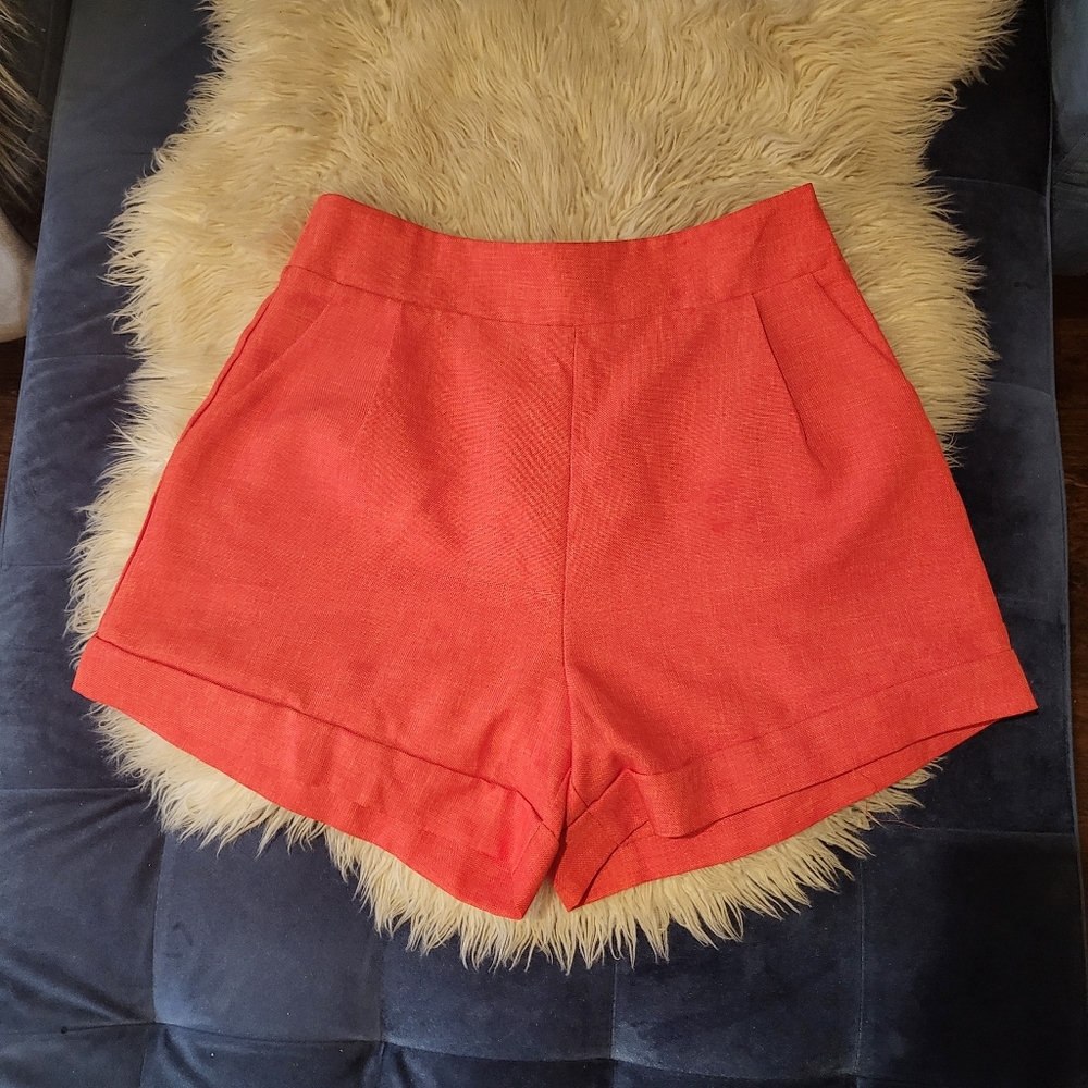 Orange shorts with pockets